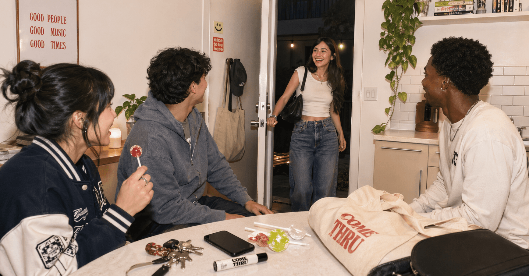 Friends arriving — come-thru products on the table